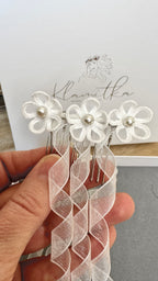 Festlicher Haarschmuck zur Erstkommunion für Mädchen, zeitloses Design.