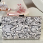 Clutch Snake Print – elegante Abendtasche in Schlangenoptik Weiß Schwarz | Damen